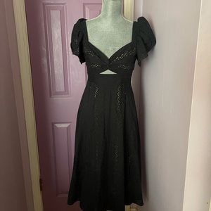 BCBGMAXAZRIA black cut out dress. Worn once.